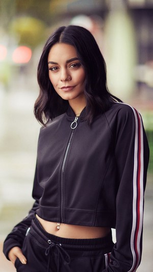 Vanessa Hudgens in a black tracksuit
