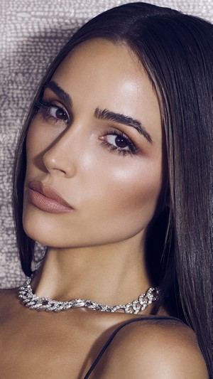 Olivia Culpo wearing a diamond necklace