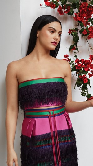 Camila Mendes in a colorful outfit