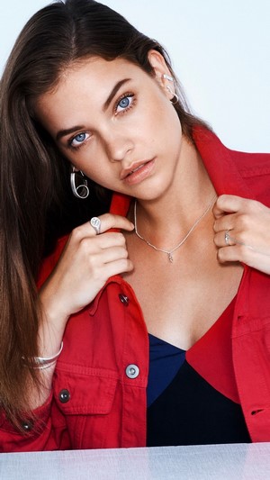 Barbara Palvin wearing a red jacket