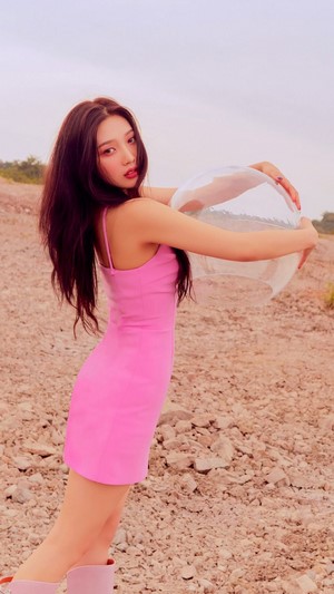 Joy from Red Velvet holding a clear ball