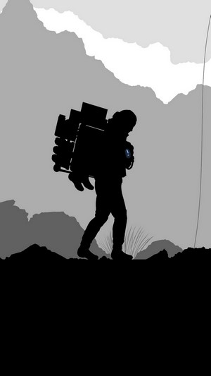 Sam Porter Bridges from Death Stranding carrying cargo