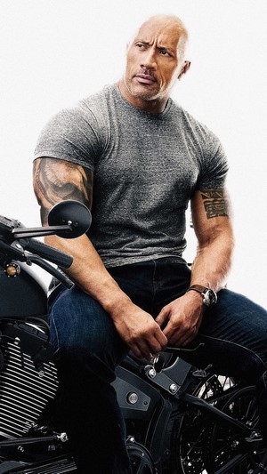Dwayne Johnson from Hobbs & Shaw on a motorcycle