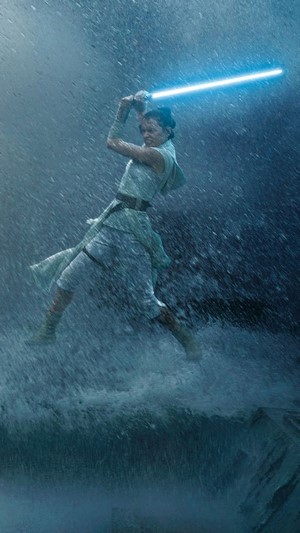 Rey from Star Wars with a lightsaber in the rain