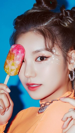 Yeji from ITZY holding a popsicle