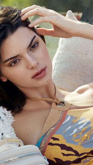 Kendall Jenner posing with a patterned top