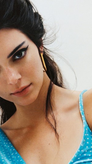 Kendall Jenner with gold earrings