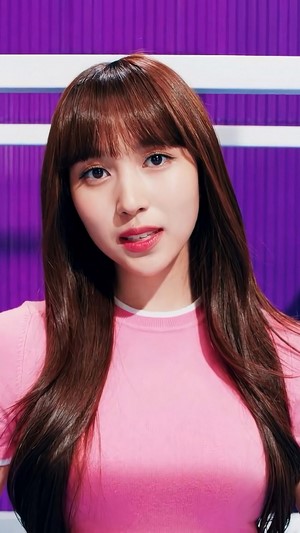 Mina from TWICE in pink shirt