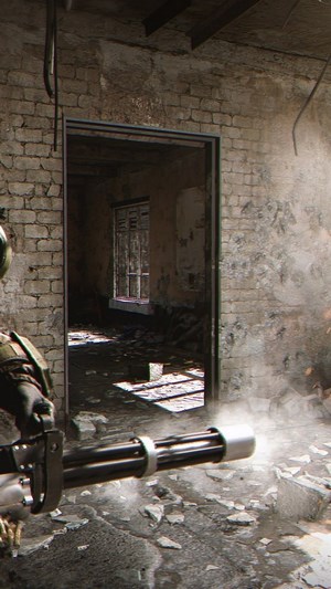 Soldier firing a minigun in a ruined building