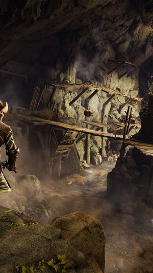 Character in a cave with wooden structures