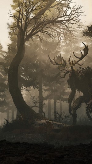 Creature with antlers in a foggy forest