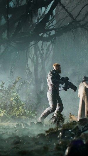 Outriders character in a misty jungle