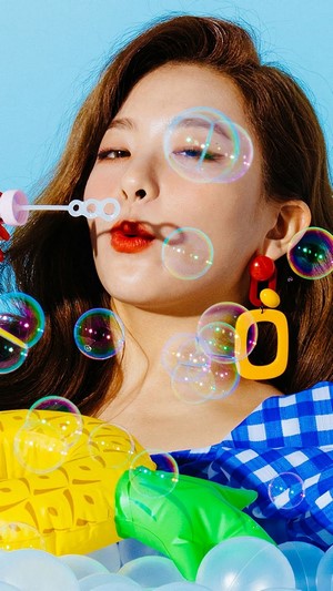 Seulgi from Red Velvet blowing bubbles