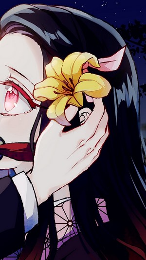 Nezuko Kamado from Kimetsu no Yaiba holding a flower