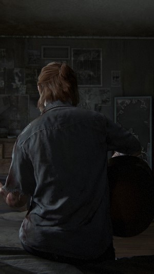 Ellie from The Last of Us Part II playing guitar