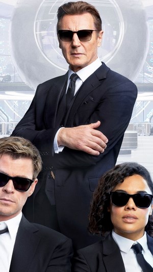 Liam Neeson, Chris Hemsworth, and Tessa Thompson in Men in Black: International