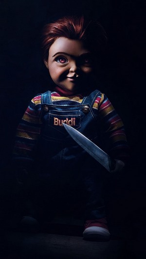 Chucky from Childs Play holding a knife