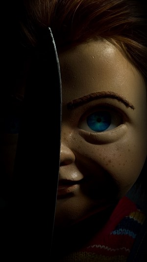 Chucky from Childs Play with a Knife