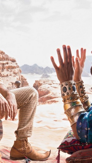 Will Smith as Genie and Mena Massoud in Aladdin