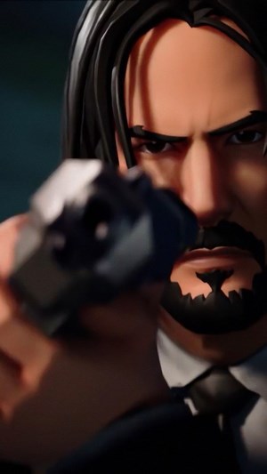 John Wick from Fortnite holding a gun