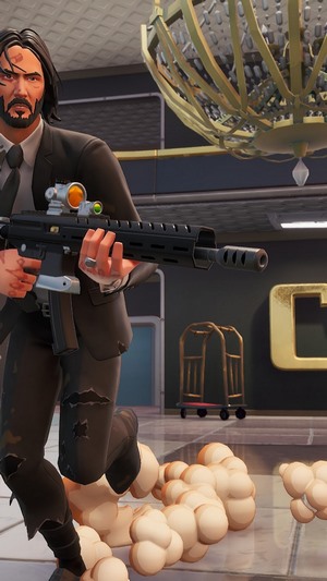 John Wick from Fortnite holding a rifle
