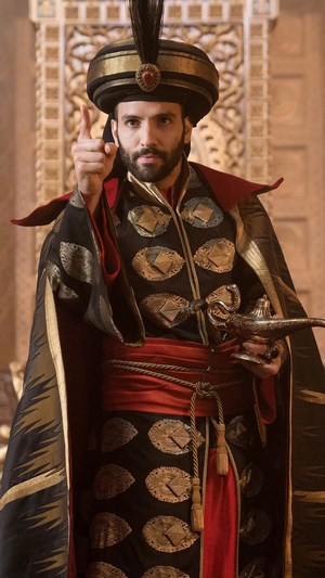 Jafar from Aladdin holding a lamp