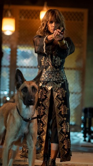 Sofia Al-Azwar from John Wick 3 with a dog
