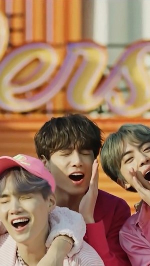 BTS members in Boy With Luv music video