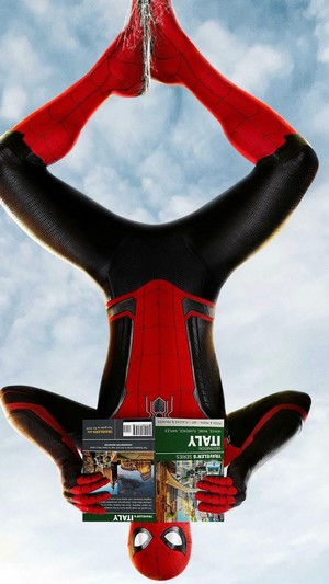 Spider-Man from Spider-Man: Far From Home holding travel guides