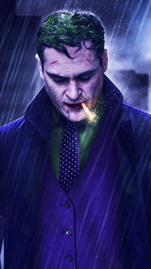 Joker from Batman smoking a cigarette in the rain