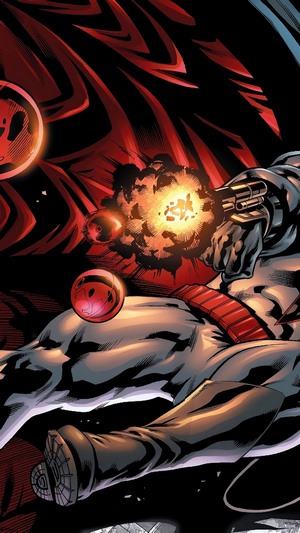 Batman firing a gun with red orbs