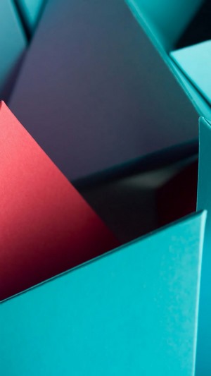 Abstract geometric shapes with red and teal colors
