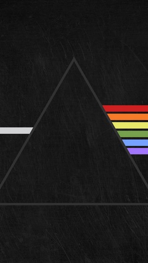 Prism refracting light into rainbow colors