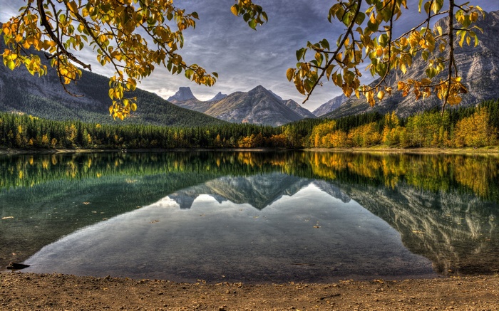 Autumn lake reflection with mountains and trees