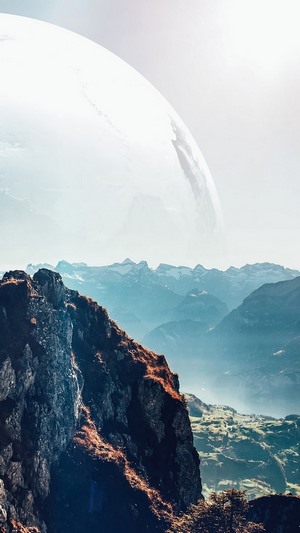 Mountain landscape with a large celestial body