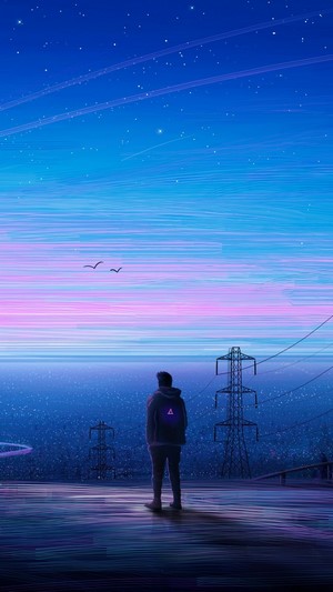 Man standing on rooftop overlooking city at sunrise