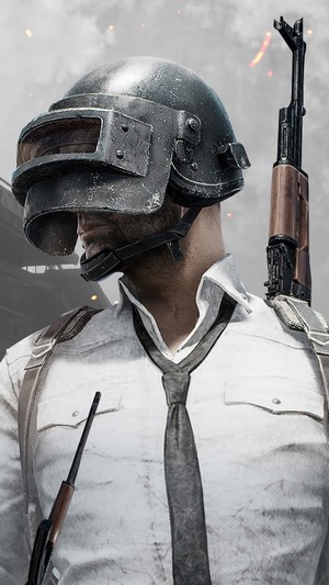 Player from PUBG wearing a helmet and holding a rifle