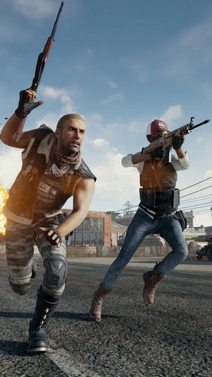 Two players running with guns in PlayerUnknown's Battlegrounds