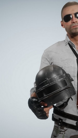 PlayerUnknowns Battlegrounds character holding a helmet