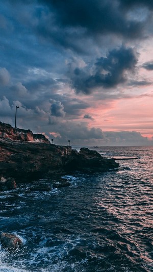 Seascape with Rocky Shoreline at Sunset