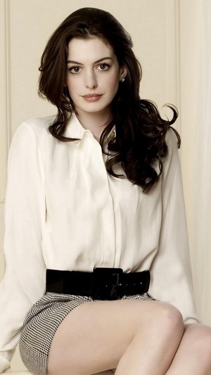 Anne Hathaway in white blouse and skirt