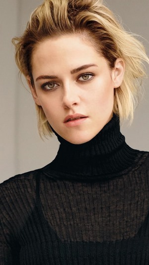 Kristen Stewart blonde woman wearing black turtleneck