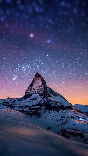 Snowy Mountain Under a Starry Night Sky