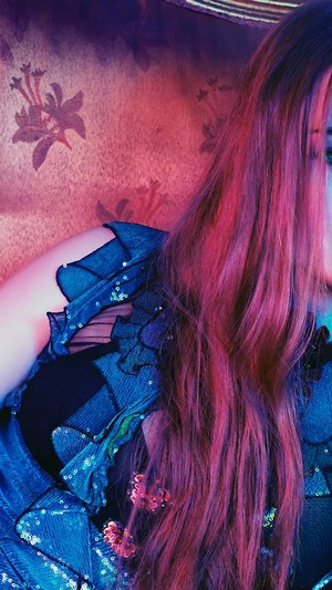 Sophie Turner with long red hair