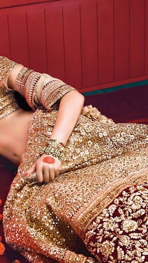 Deepika Padukone in ornate golden lehenga