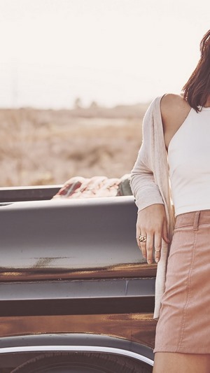 Kendall Jenner leaning on a truck
