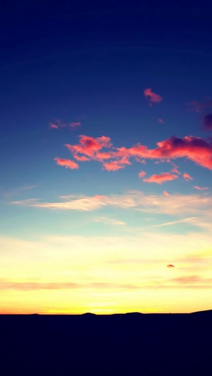 Sunset over a dark horizon