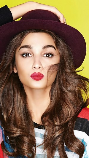Alia Bhatt wearing a hat and blowing a kiss