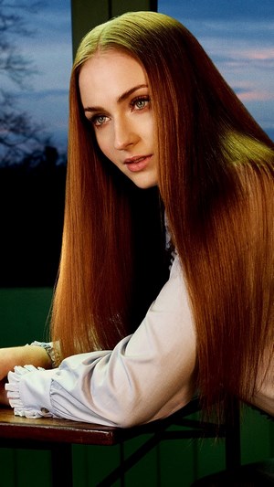 Sophie Turner with long red hair