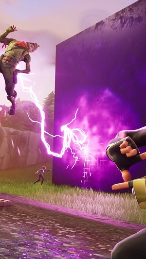 Fortnite characters interacting with a purple cube and lightning
